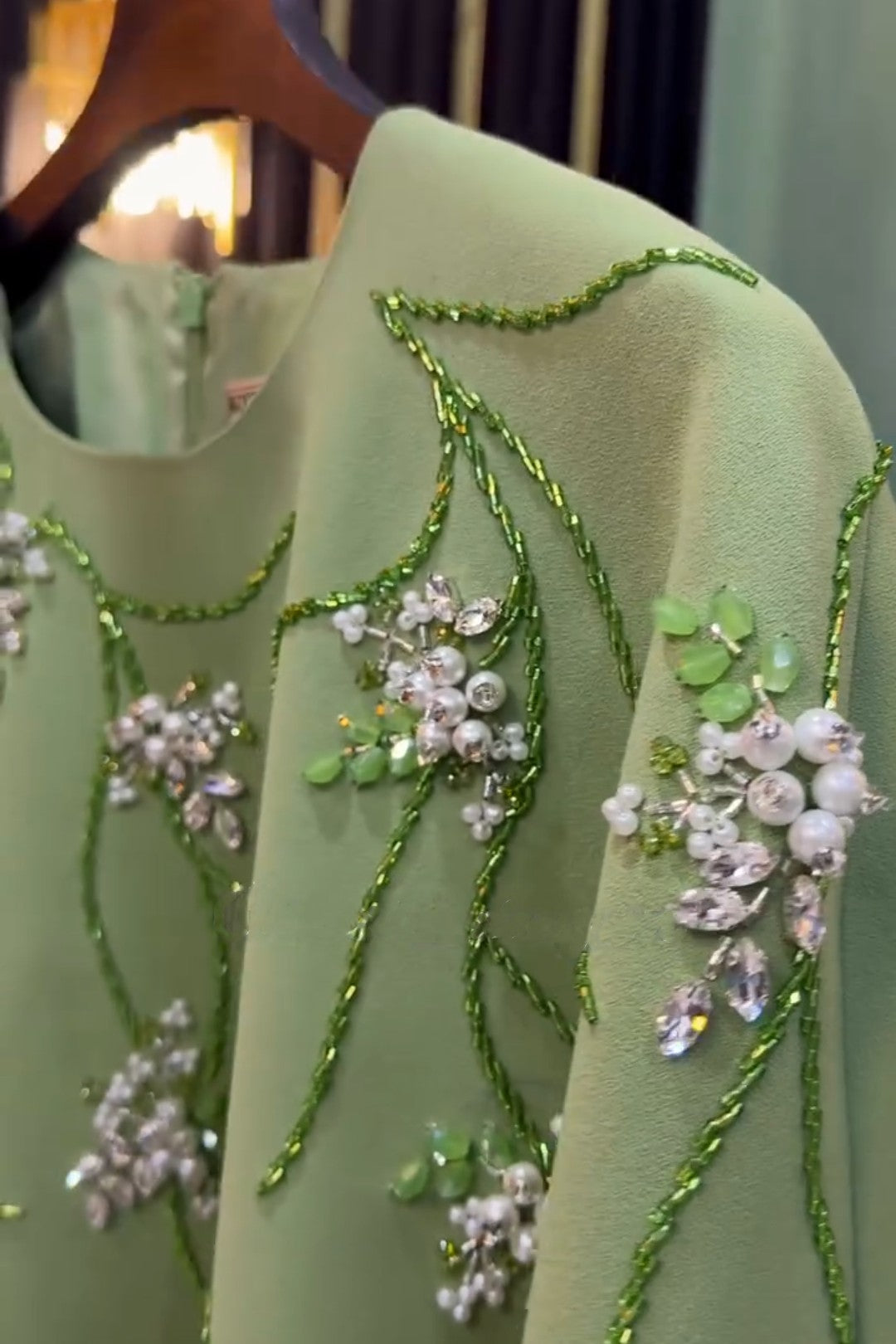 Rhinestone Embroidered Tassel Pullover Top